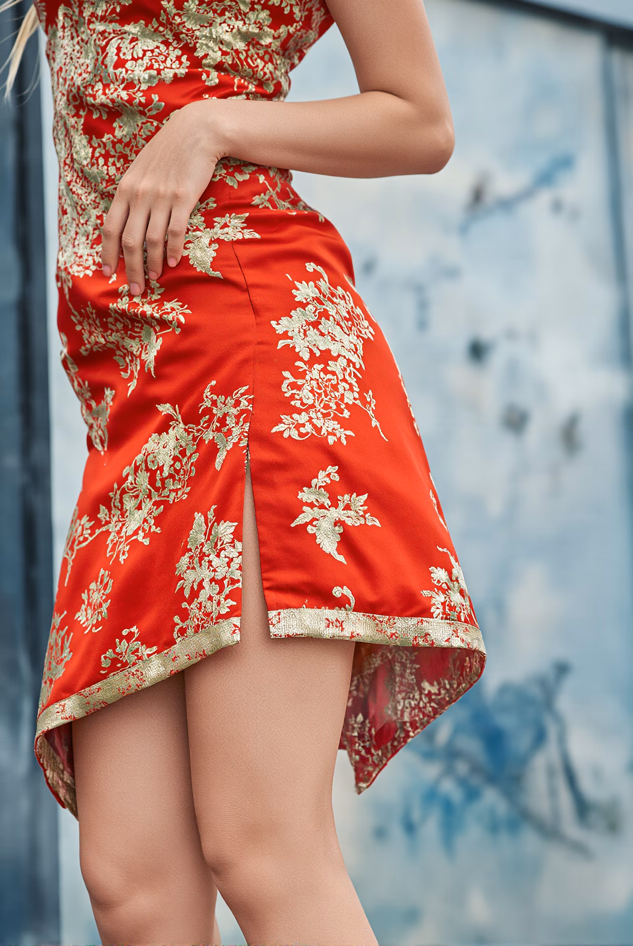Close-up portrait of a 26-year-old Czech woman wearing a red cheongsam in the streets of Hong Kong.