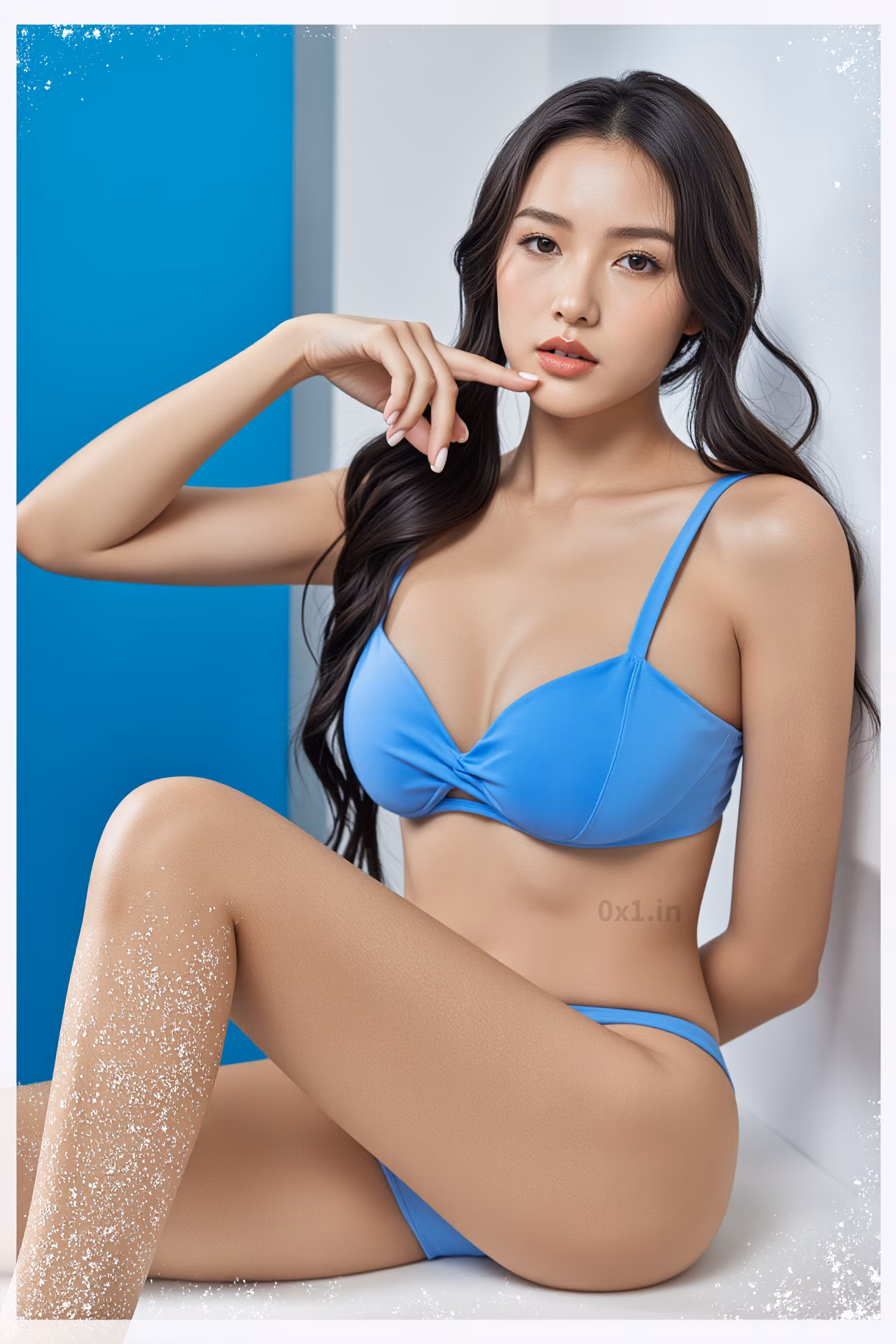 Close-up of a 22-year-old Malaysian woman in a blue bikini at the beach, showcasing her beauty